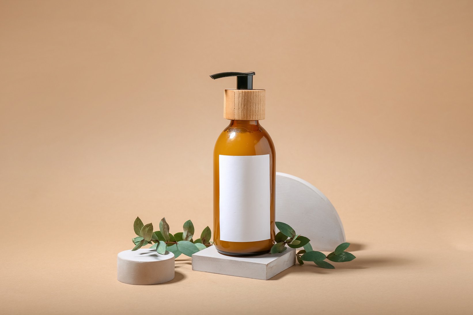 Composition with Bottle of Natural Shampoo on Color Background